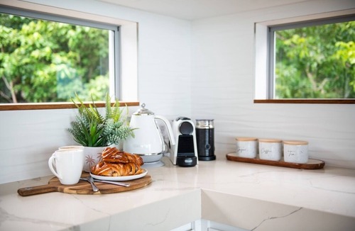 Airlie Beach House | Luxurious 5-bed home with pool, nestled in a private estate with ocean views