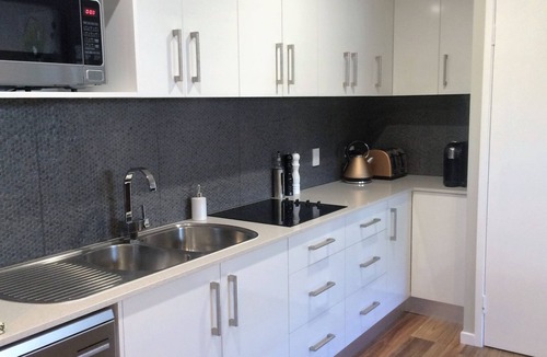 Coolum Beach Cottage | Luxurious, private cottage for couples with heated spa