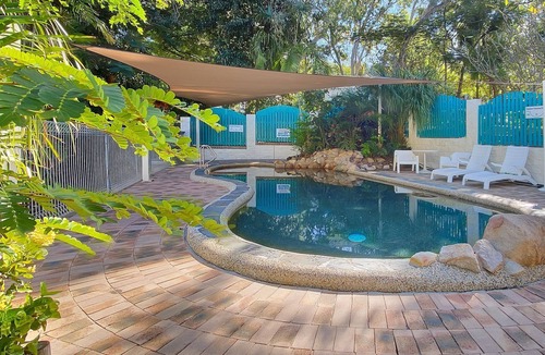 Arcadia Apartment | Magnetic Reef 3 - Relaxing tropical getaway with lush gardens and complex pool, minutes to Alma Bay