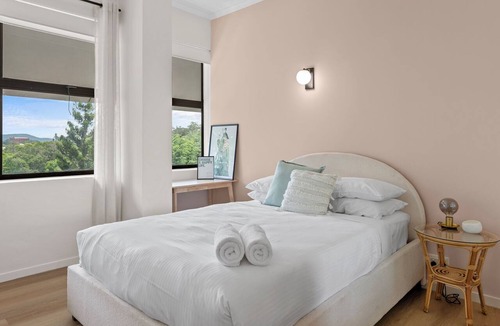 Spring Hill Apartment | Mediterranean Style Steps from the CBD