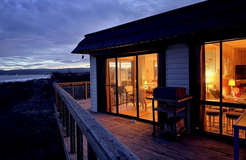 Dolphin Sands House | Mid-century beach house on five private acres, dogs welcome