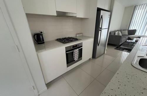 Liverpool Apartment | Modern 2 bedroom & 2 bathroom apartment with stunning Sydney CBD & Skyline Views!