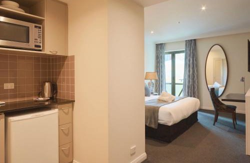 Chinatown Apartment | Modern Nomads City-bound King Studio with Indoor Pool