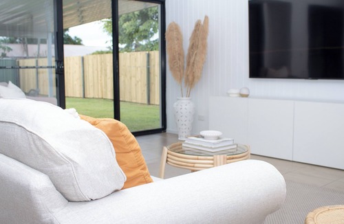 Wurtulla House | Palm Coastal Retreat - Family & Pet-Friendly, Spacious Yard, 5 Mins to Beach!
