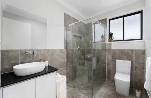 Clontarf House | PAREA | Designer Beachside Villa Spa & PoolTable