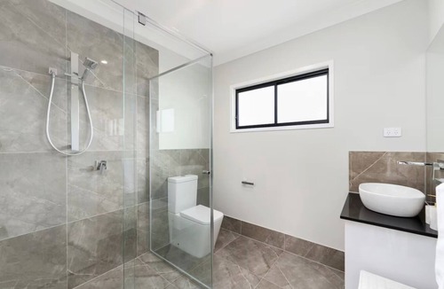 Clontarf House | PAREA | Designer Beachside Villa Spa & PoolTable