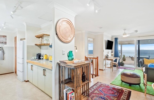 Halls Head Villa | PRIME BEACHFRONT. PRIME VIEWS. PRIME TIME. Elegance, with mobility elevator.