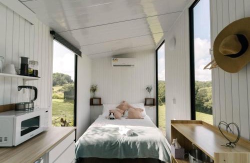 Kuranda House | Rainforest Sunsets by Tiny Away
