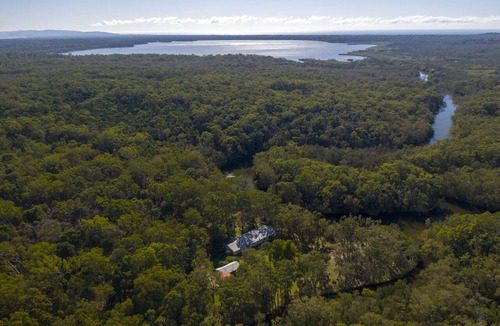 Cooroibah House | Rare wilderness riverfront 15 mins from Hastings St