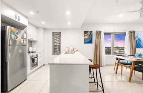 Darwin City Centre Condo | Reef-side Splendor: City Vistas ~ Pool ~ Workspace