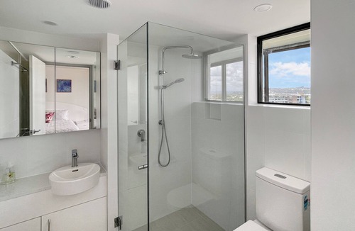 Maroochydore Apartment | Relaxing Escape: Pool, Tennis Court, Garden Terrace & Water Views
