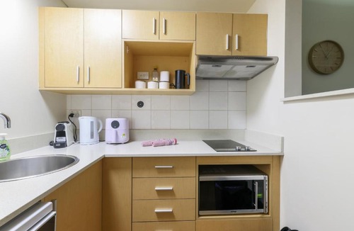 Darwin City Centre Apartment | Resort Escape King Bed Pool Balcony