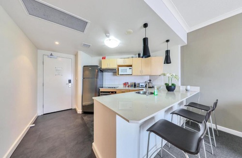 Darwin City Centre Apartment | Resort Style Escape King Bed Pool Balcony