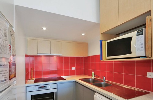 Woodgate House | Retro Esplanade property with Ocean views