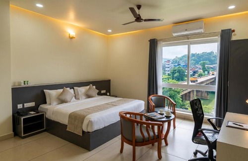 Mukkam Hotel | RIVULET River Side Budget Business Class Hotel