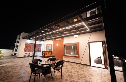 Devanahalli Apartment | Runway Retreat Rooftop Swing, Airport View