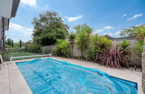 Curtin House | Serene 3-Bedroom Oasis with Pool & Lush Garden