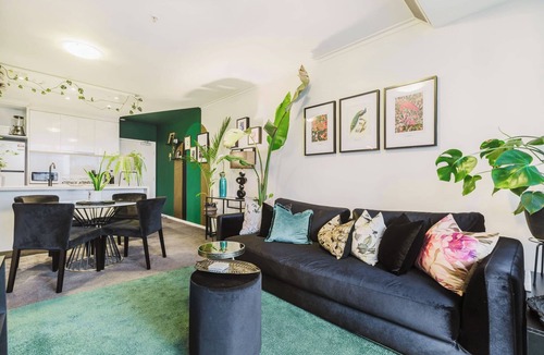 Southbank Condo | Serene botanical oasis with city views and sunroom