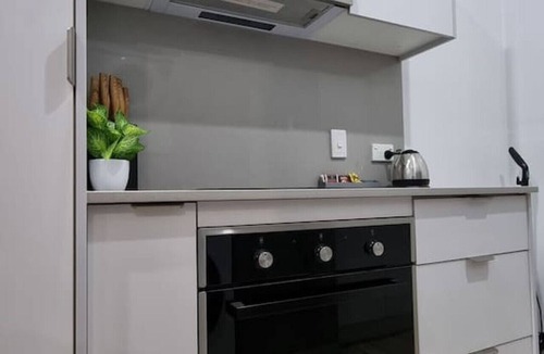 Wishart Apartment | Serene Wishart Haven: 1BR Private Parking M15