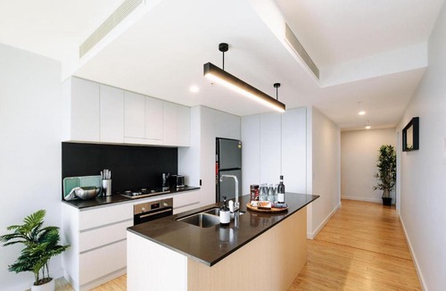 South Brisbane Apartment | Skyline Serenity 2BR Apt with River & City Views