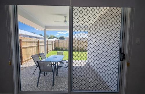 Warner House | Solara Retreat - Modern 4BR Home with Backyard