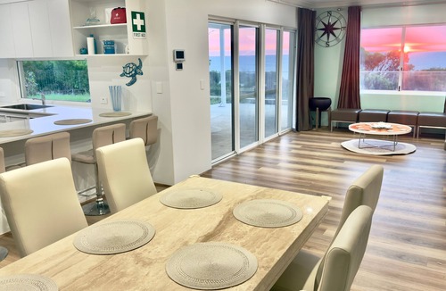 Waikiki House | Spacious, secure, modern beachfront paradise.