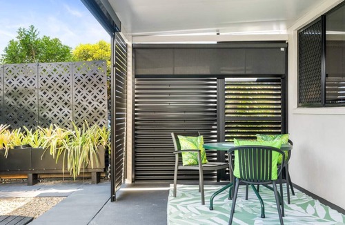 Wooloowin Apartment | Stylish Apartment with Private Patio & Garden