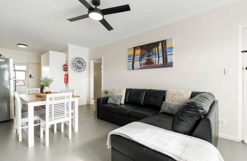 West Beach Apartment | Stylish Seaside Suite with Arcade and Balcony
