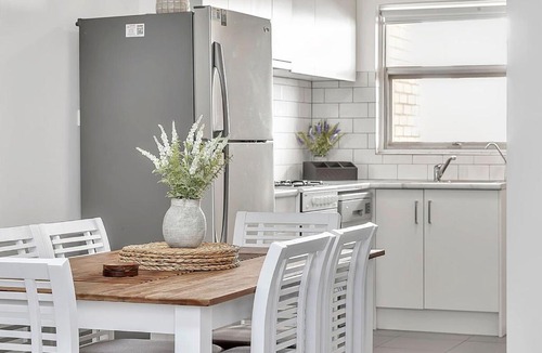 West Beach Apartment | Stylish Seaside Suite with Arcade and Balcony