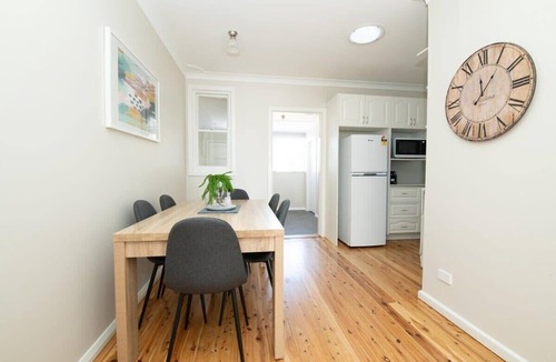 Glenroi House | Sweet Caroline. Sunroom & Garden. Orange.