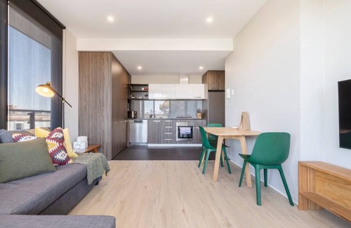Brunswick Apartment | Terra Cotta Brunswick Retreat with Breezy Balcony