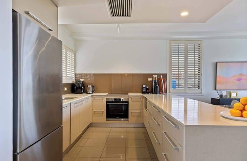 Cairns North Apartment | The Abbott—A Sea-Swept Esplanade Abode