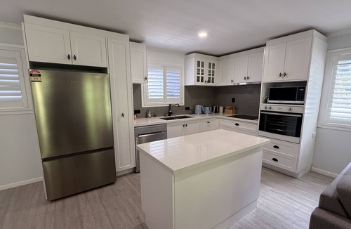 Toogoom Apartment | The Palms - Beach Retreat with Pool, Garden, BBQ