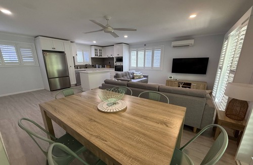 Toogoom Apartment | The Palms - Beach Retreat with Pool, Garden, BBQ