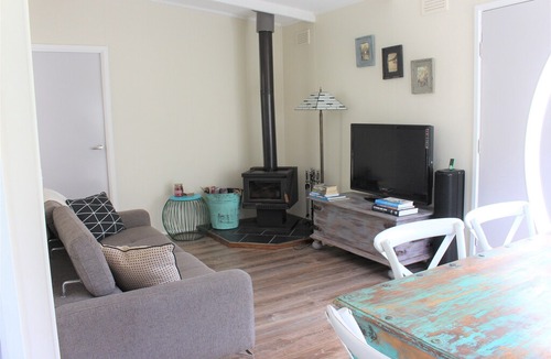 Sandy Point House | The Surf Shack is a short walk to the beautiful beach for relaxation or surfing.