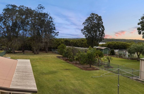 Culburra Beach House | The Waters Edge - Pet Friendly with Fire Pit