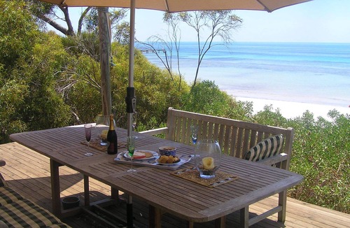 Emu Bay House | This luxury beachfront home shares the sand dune with Little Penguins