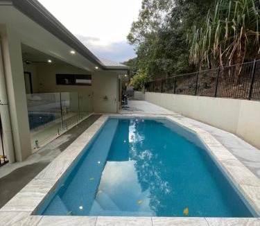 Trinity Beach House | Trinity Beach Haven - Luxury 4 Bedroom Home with Pool, Steps to the Beach, Surrounded by Mountains