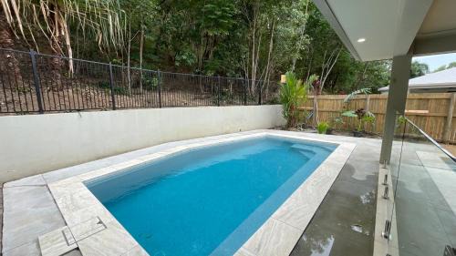 Trinity Beach House | Trinity Beach Haven - Luxury 4 Bedroom Home with Pool, Steps to the Beach, Surrounded by Mountains