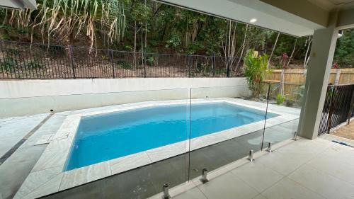 Trinity Beach House | Trinity Beach Haven - Luxury 4 Bedroom Home with Pool, Steps to the Beach, Surrounded by Mountains