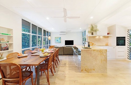 Rapid Creek House | Tropical Luxe Treehouse Lush Poolside Living