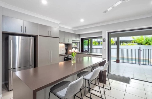 Kewarra Beach House | Tropical Pool Sanctuary in Kewarra Beach, Family and Dog Friendly