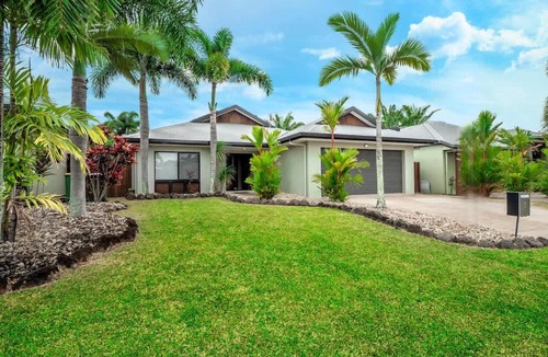 Kewarra Beach House | Tropical Pool Sanctuary in Kewarra Beach, Family and Dog Friendly