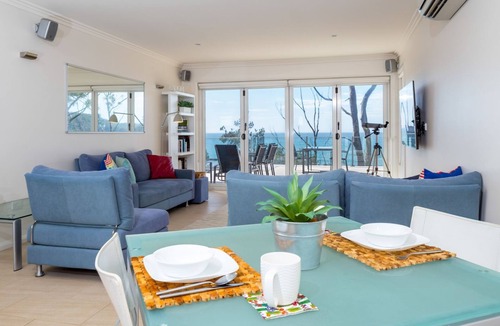 Denhams Beach Apartment | Unbeatable ocean views from beautiful private apartment on Denhams Beach.