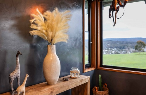 Hepburn Cottage | Unique luxury + salvage + African theming = Heaven