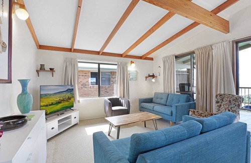 Point Lookout Apartment | Watch whales and passing ships from your covered deck.