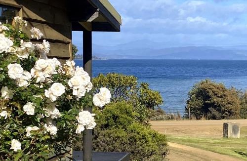 Lunawanna House | Waterfront Cabin Retreat - Sea Views with Breakfast Hamper & Local Produce
