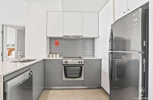Cairns Central Business District Condo | Waterfront Luxury at Harbour Lights: Stunning Marina Views & Prime Cairns Location