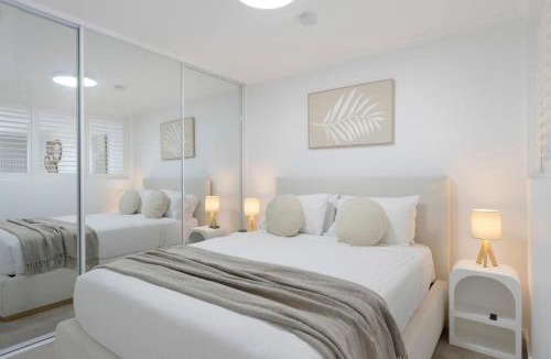 The Entrance Apartment | Waterfront, Pool, Balcony, Prime Location