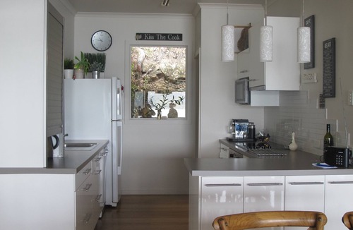 Little Wobby House | Waterfront with private jetty and sunset views. Boat access only. Pet friendly.